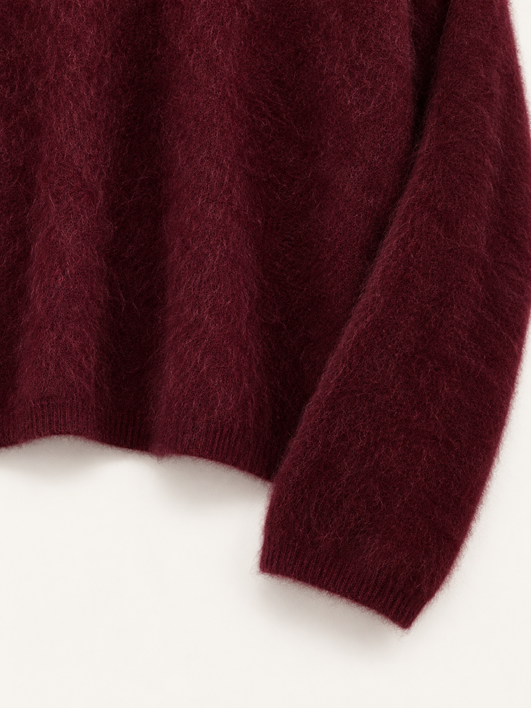 Maglia boxy girocollo — Bordeaux, Dettaglio del polsino e del fondo