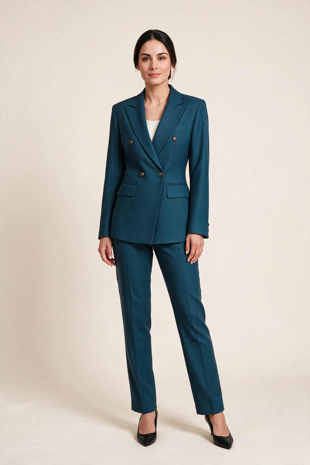 Double-breasted suit with ankle-length trousers — Petrol blue, worn by Sofia, front view