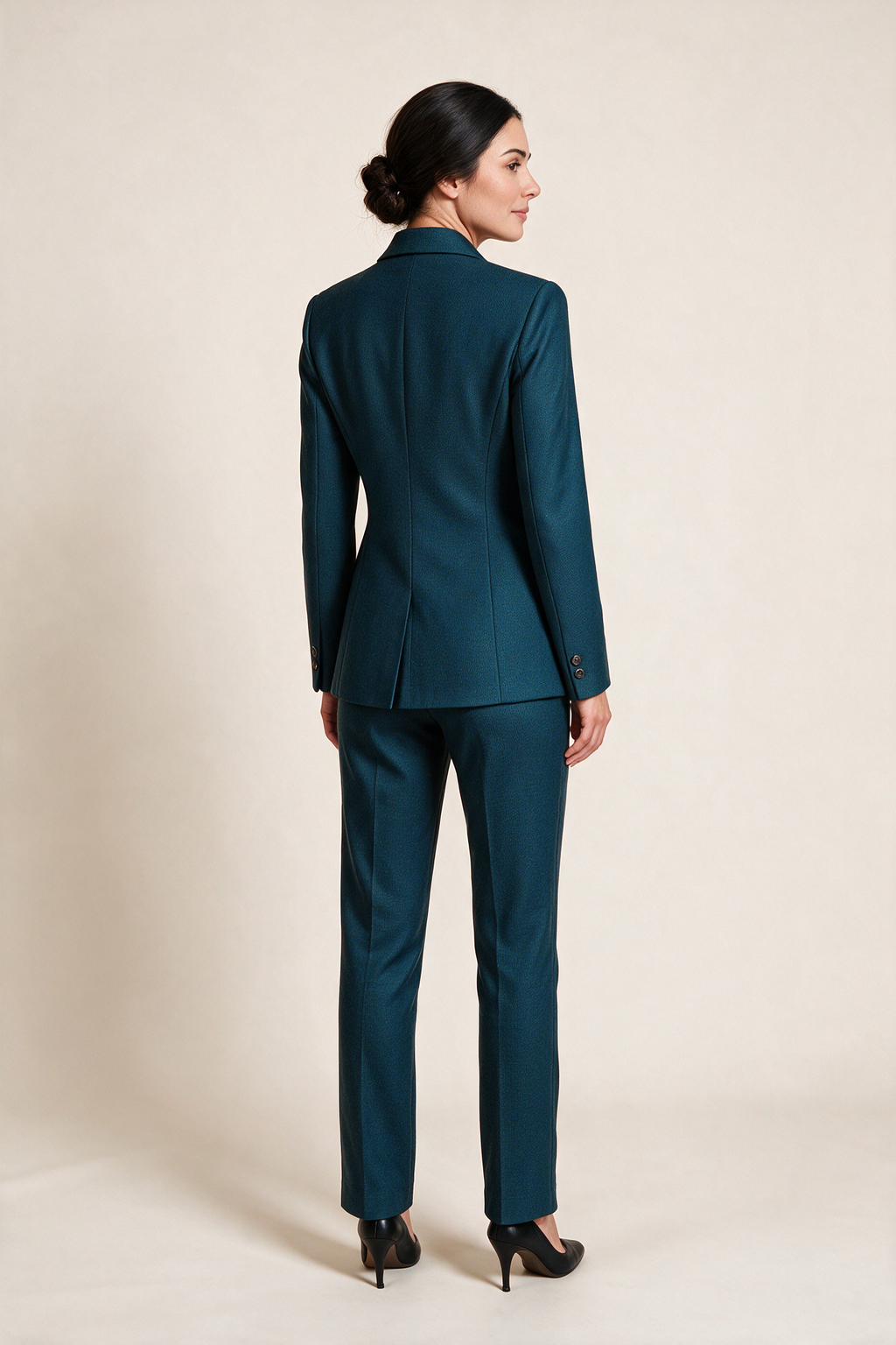 Double-breasted suit with ankle-length trousers — Petrol blue, worn by Sofia, rear view