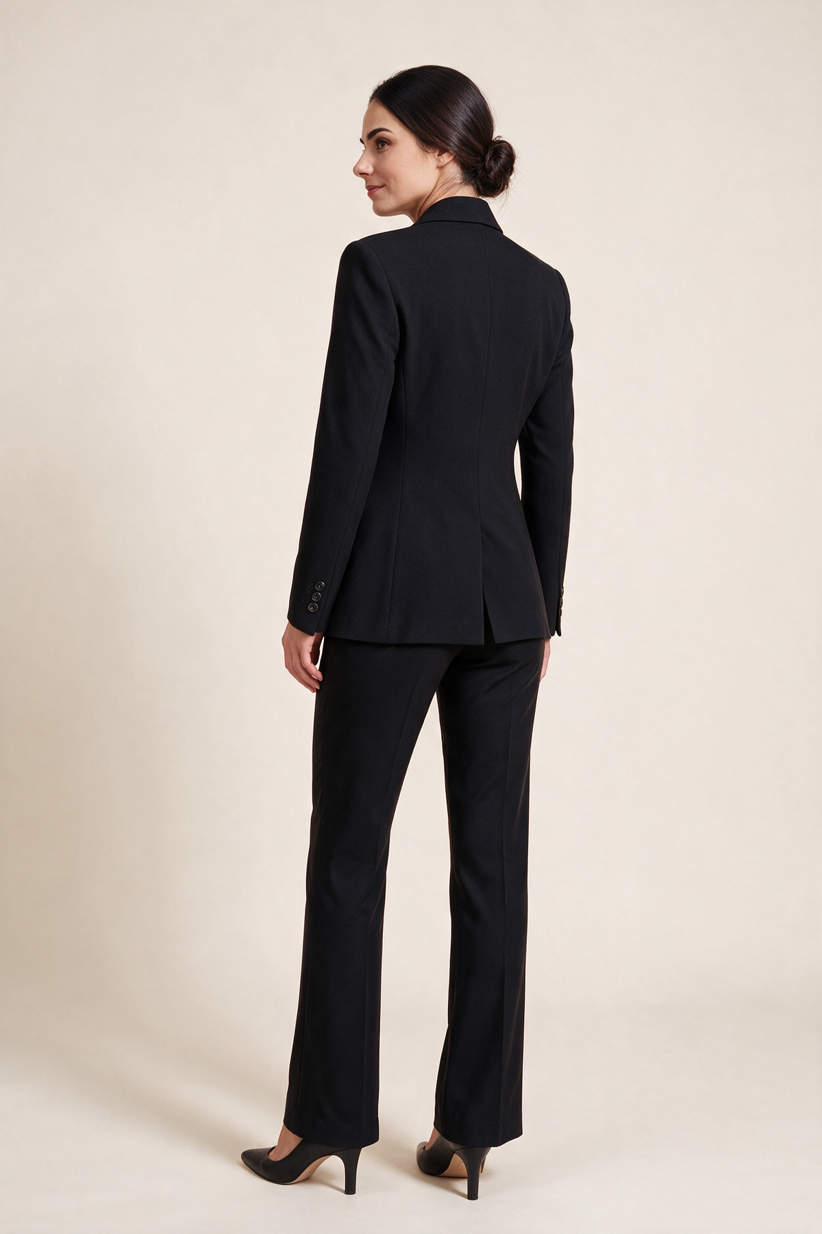 Single-breasted suit with flared trousers — Black, worn by Sofia, rear view looking over her shoulder