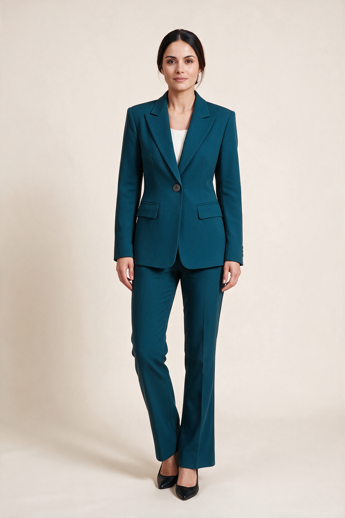 Single-breasted suit with flared trousers — Petrol blue, worn by Sofia, front view