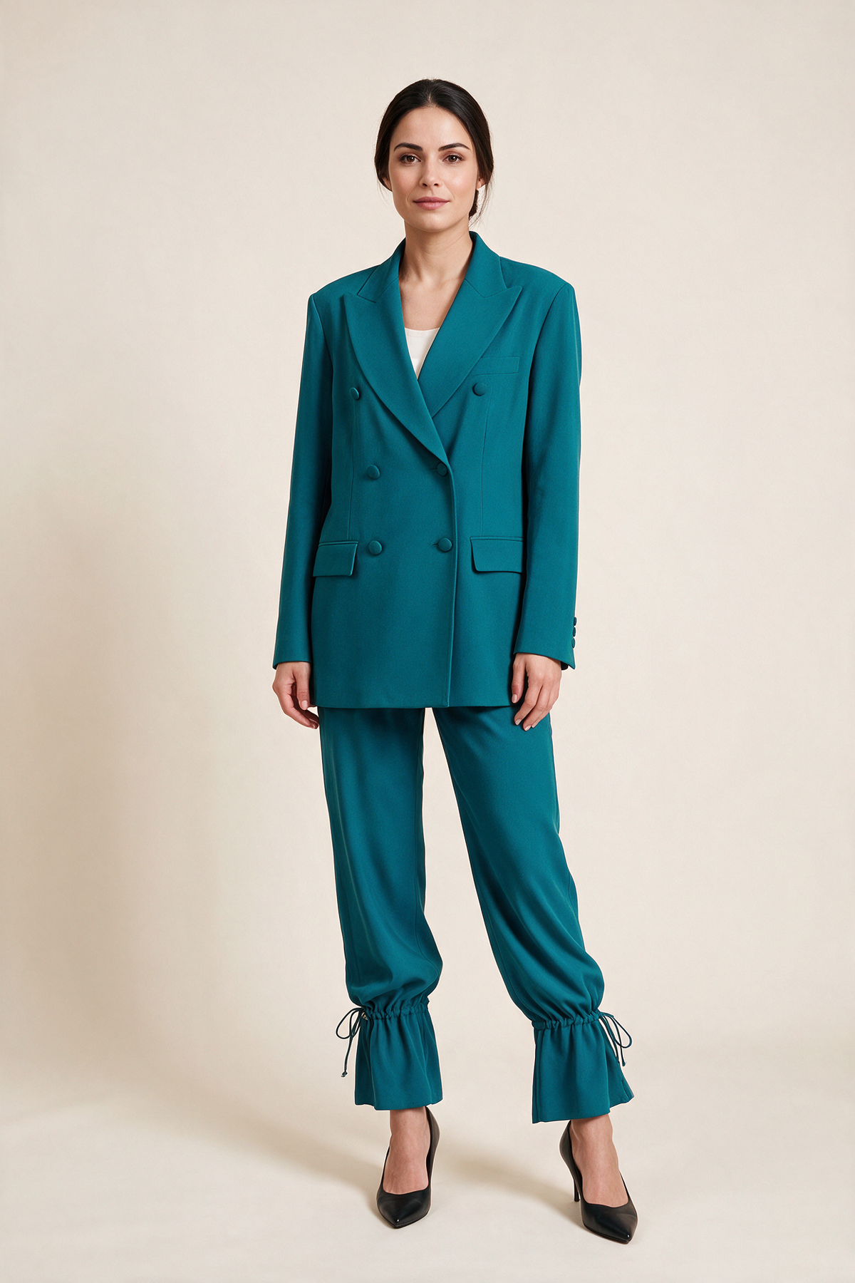 Double-breasted suit with gathered hems — Teal, worn by Sofia, front view