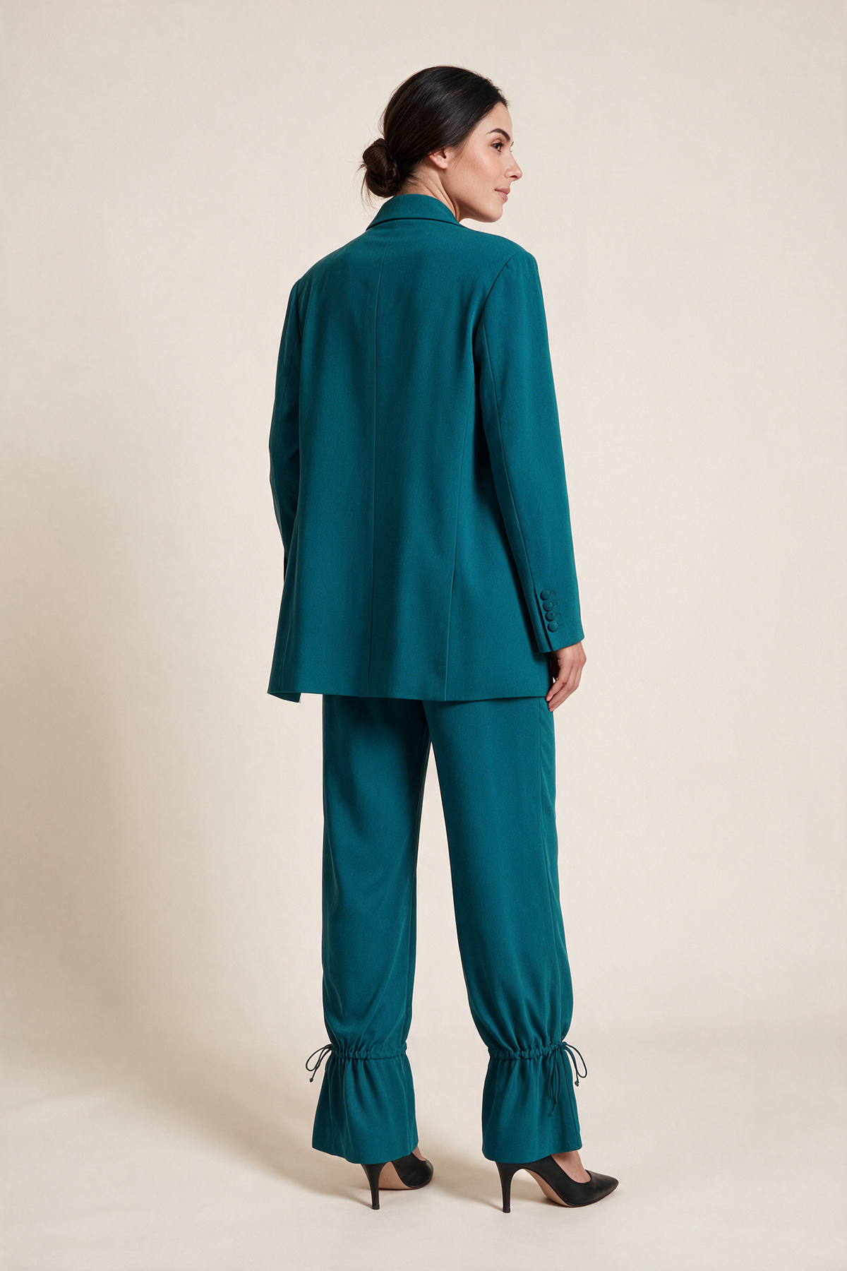 Double-breasted suit with gathered hems — Teal, worn by Sofia, rear view